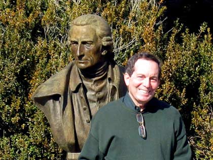 Jim poses with bust of Henry